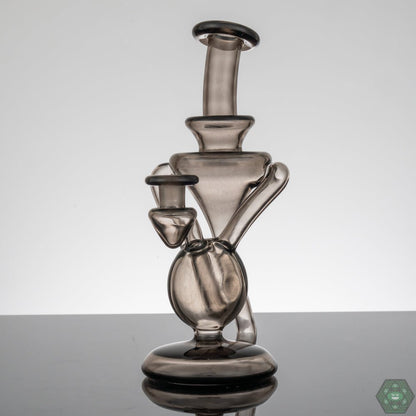 Elegant Dab Rig with 2-Hole Perc: The M Henny Smoke Recycler combines elegant design with a 2-hole percolator for enhanced filtration and a refined dabbing experience.