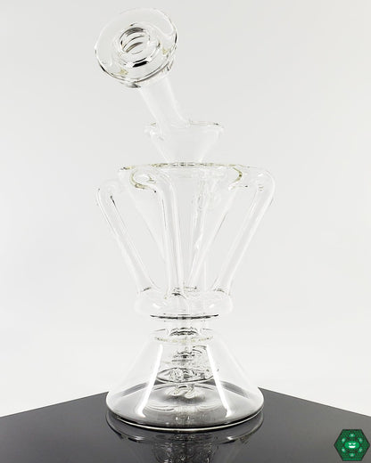 Elegant and Functional Glass Recycler: The McGrew Glass Clear Internal Recycler #3, a beautiful and high-performing piece designed for smooth, filtered hits and an elevated experience, perfect for collectors.


