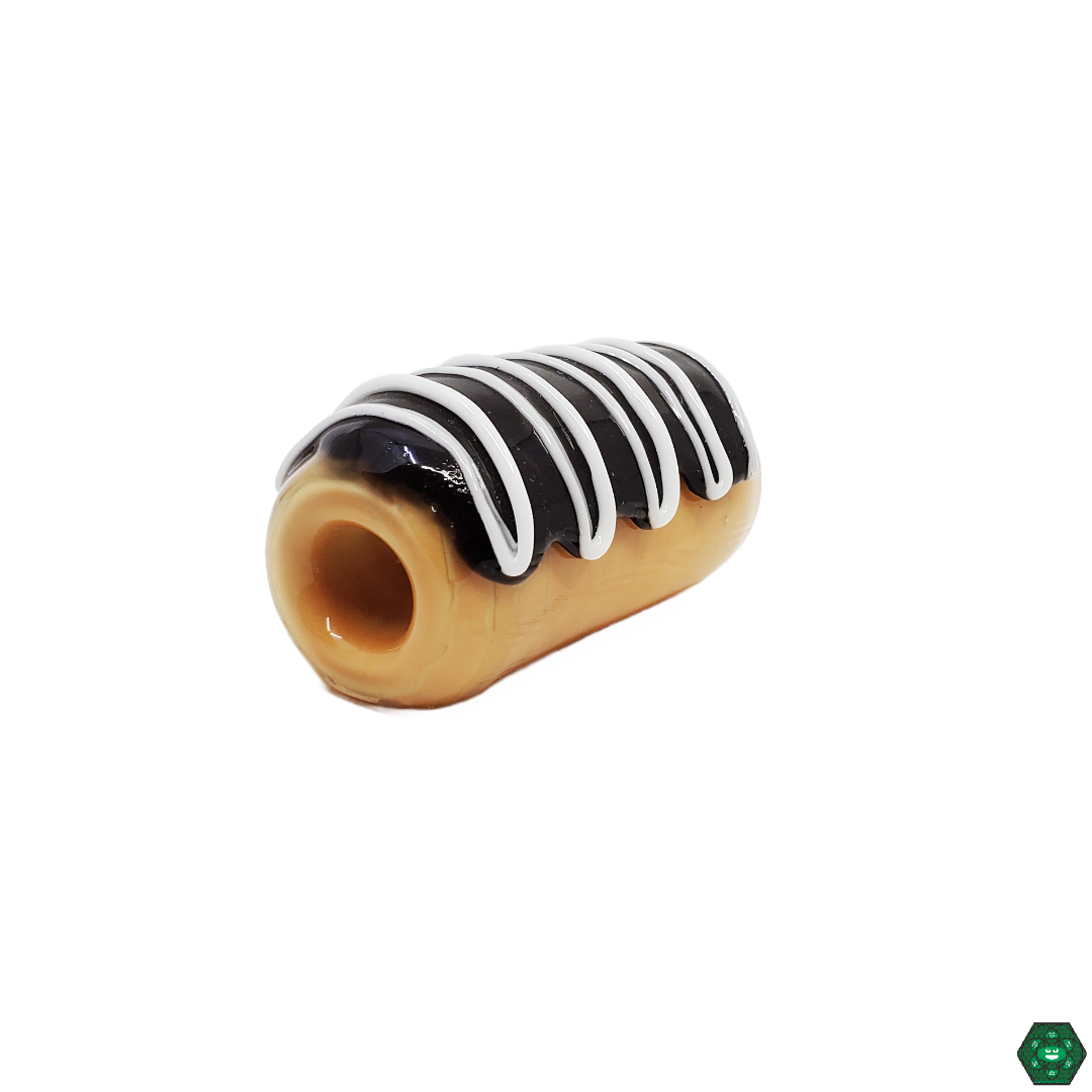 Empire Glassworks Chocolate Long John Spoon Pipe in hand, demonstrating its comfortable grip and the smooth, enjoyable draws for donut lovers and art glass enthusiasts alike.