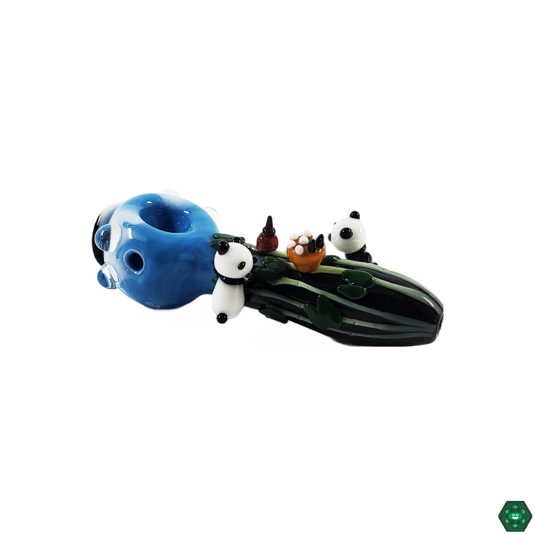 Empire Glassworks Climbing Pandas Spoon in hand, illustrating its ergonomic design and comfortable grip, perfect for collectors and enthusiasts.