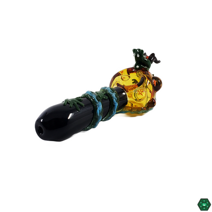 Empire Glassworks Dragon Sphere Spoon (Mini) in hand, highlighting its portable size and smooth airflow for easy use on-the-go.