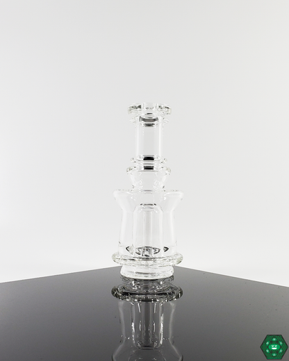  Enhanced Puffco Attachments: Ery Glass upgrades your Puffco experience with custom glass attachments, featuring a one-hole perc for improved function and available in a 4.25"-5" height and 1.75" diameter.