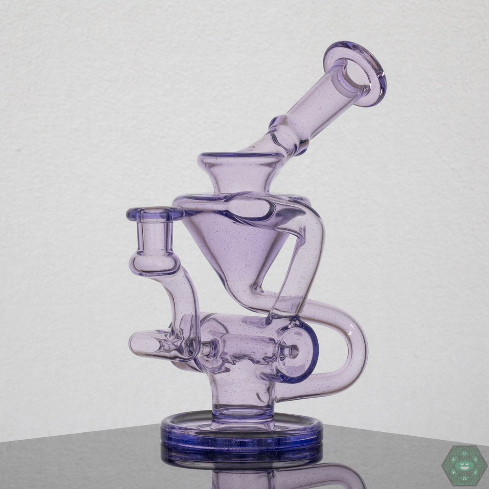 Eric Law Compact Recycler, a 6.5-inch premium glass piece with an inline perc for enhanced airflow and smooth hits.