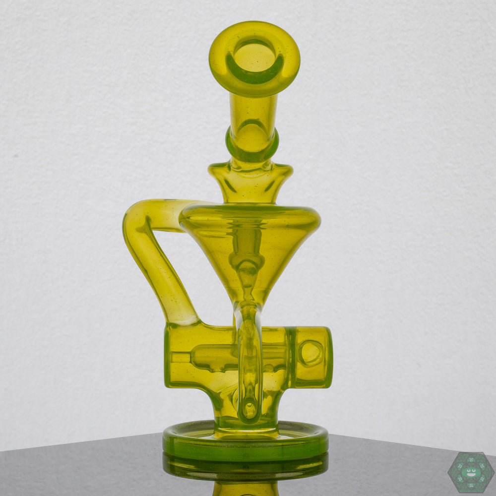 Eric Law Inline Perc Mini Recycler, a high-quality 6.5-inch glass rig offering smooth, filtered hits.