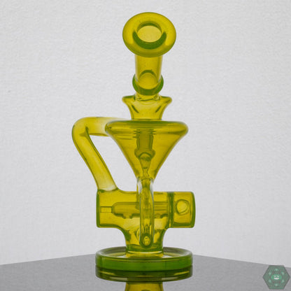 Eric Law Inline Perc Mini Recycler, a high-quality 6.5-inch glass rig offering smooth, filtered hits.