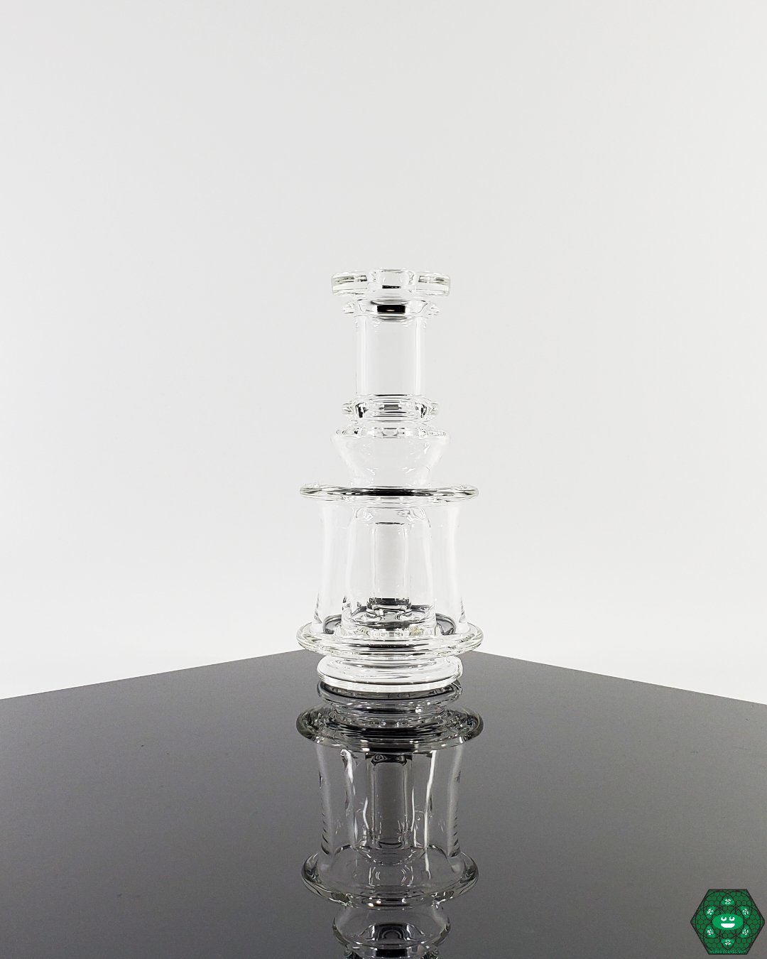 Ery Glass Puffco Attachment Details: Close-up showcasing the craftsmanship and one-hole perc of these custom glass enhancements for Puffco devices, available in a 4.25"-5" height and 1.75" diameter.


