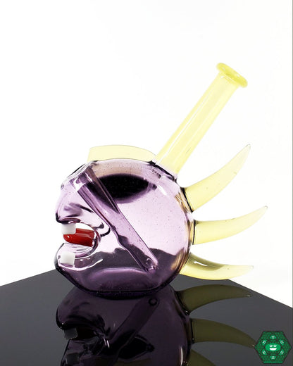 Etai Rahmil Glass Shredder – Compact handcrafted glass art with a 2-hole perc, 10mm female 45° joint, and available in Purple Rain and Pastel Serum colors.