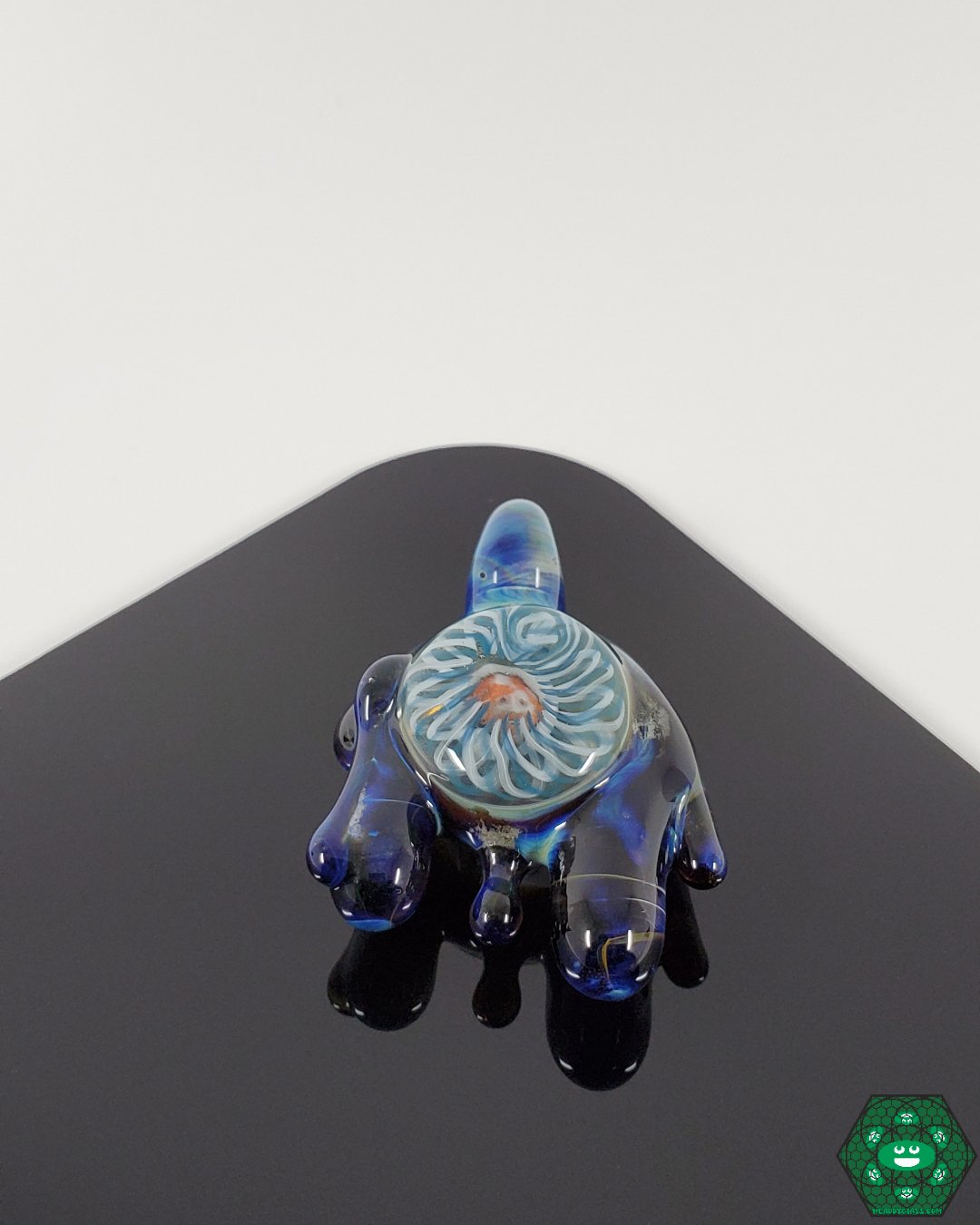 Face Pendant, a handmade glass art jewelry piece, perfect for collectors seeking a distinctive and stylish wearable design.

