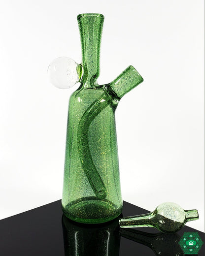 Freeman Mini Tube by Justin Freeman Glass – Green with dichroic finish, matching bubble cap, and 2-hole perc for enhanced filtration and style.