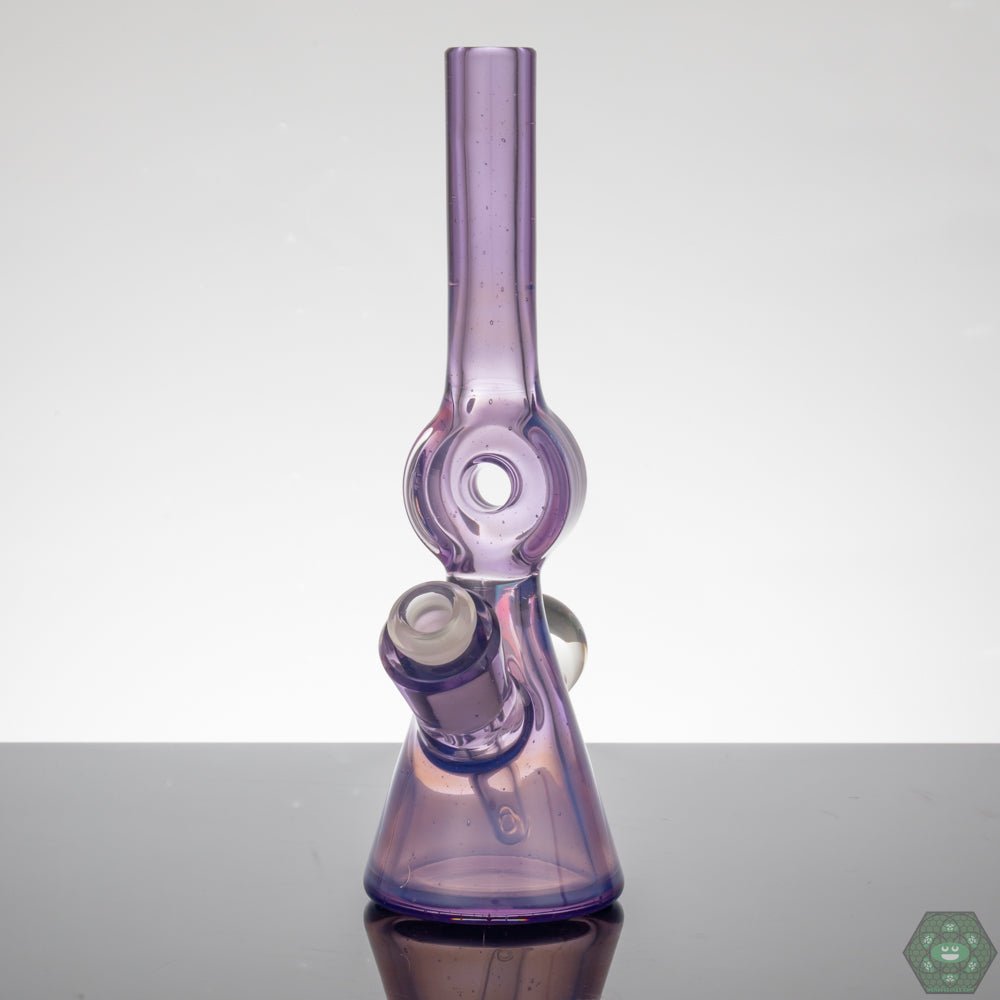 Gemini Glass Wild Berry Donut Tube, a flavorful glass smoking rig featuring a wild berry color scheme and a donut-shaped body for enhanced airflow, perfect for flower and concentrates, ensuring smooth, flavorful hits, made with quality materials, a functional piece and a colorful addition to any collection.