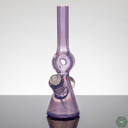 Gemini Glass Wild Berry Donut Tube, a flavorful glass smoking rig featuring a wild berry color scheme and a donut-shaped body for enhanced airflow, perfect for flower and concentrates, ensuring smooth, flavorful hits, made with quality materials, a functional piece and a colorful addition to any collection.