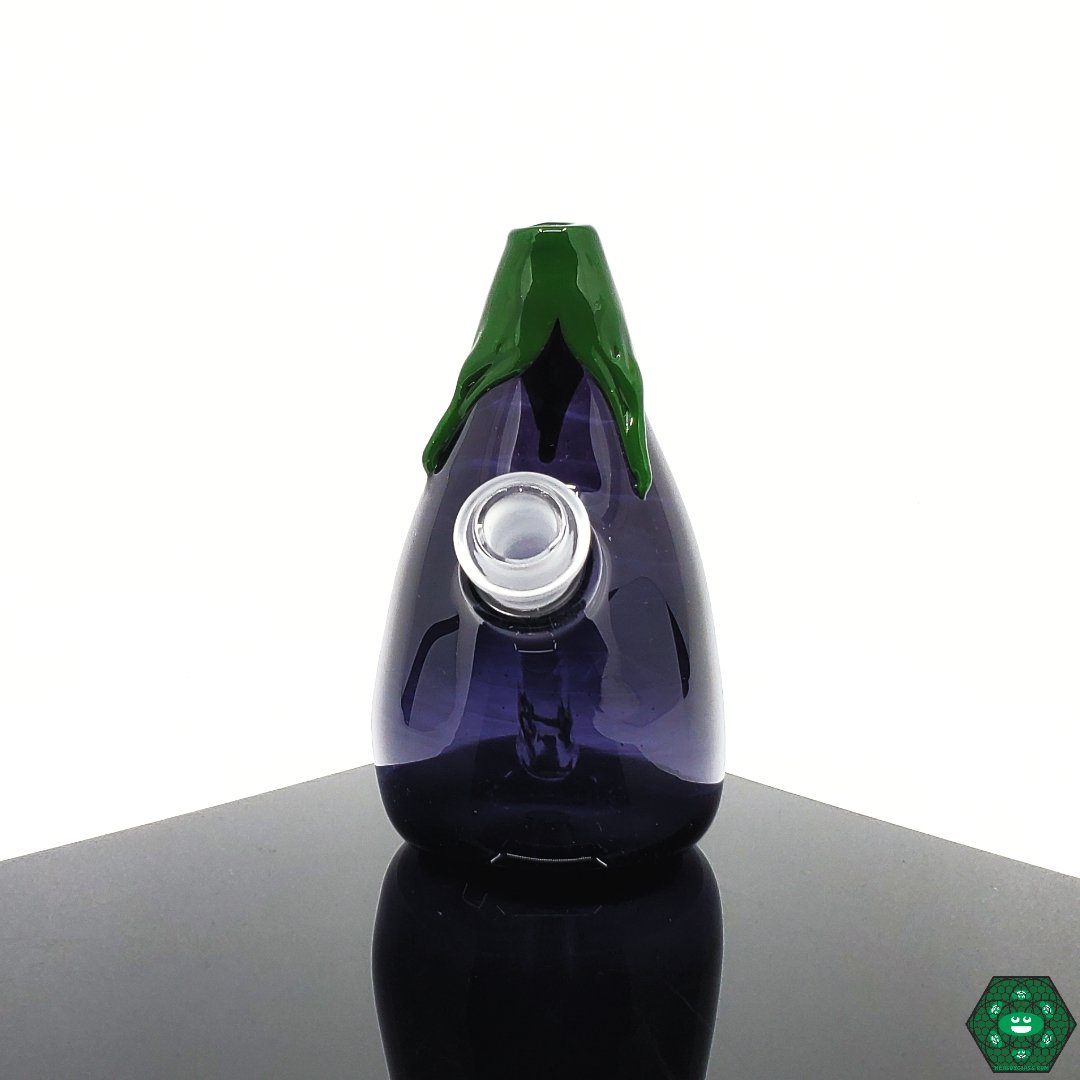 Glass By Boots Eggplant – Unique eggplant-inspired handcrafted dab rig with a 10mm joint, removable downstem, and optimal airflow for smooth hits.