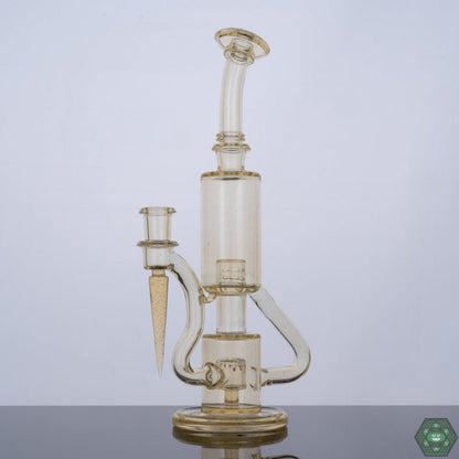 The Glass Carpenter Plasma Bubble Dumper, a 10mm handcrafted dab rig featuring a unique bubble perc for a smooth and flavorful experience in a compact form, ideal for both casual and experienced users.