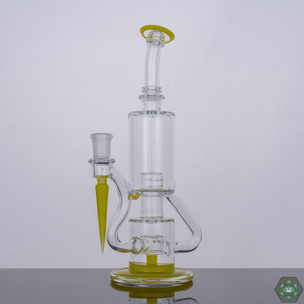 The Glass Carpenter Roswell Bubble Dumper, a 14mm alien-inspired recycler featuring a unique 11-hole perc for ultra-smooth pulls and optimal filtration, handcrafted by The Glass Carpenter for a striking look and superior dabbing experience.


