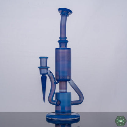 The Glass Carpenter Sonic Bubble Dumper, a 14mm recycler rig featuring a sonic-inspired bubble perc for enhanced filtration, combining functionality with futuristic design, a handcrafted piece designed to elevate your sessions, both visually and technically impressive.


