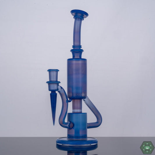 The Glass Carpenter Sonic Bubble Dumper, a 14mm recycler rig featuring a sonic-inspired bubble perc for enhanced filtration, combining functionality with futuristic design, a handcrafted piece designed to elevate your sessions, both visually and technically impressive.


