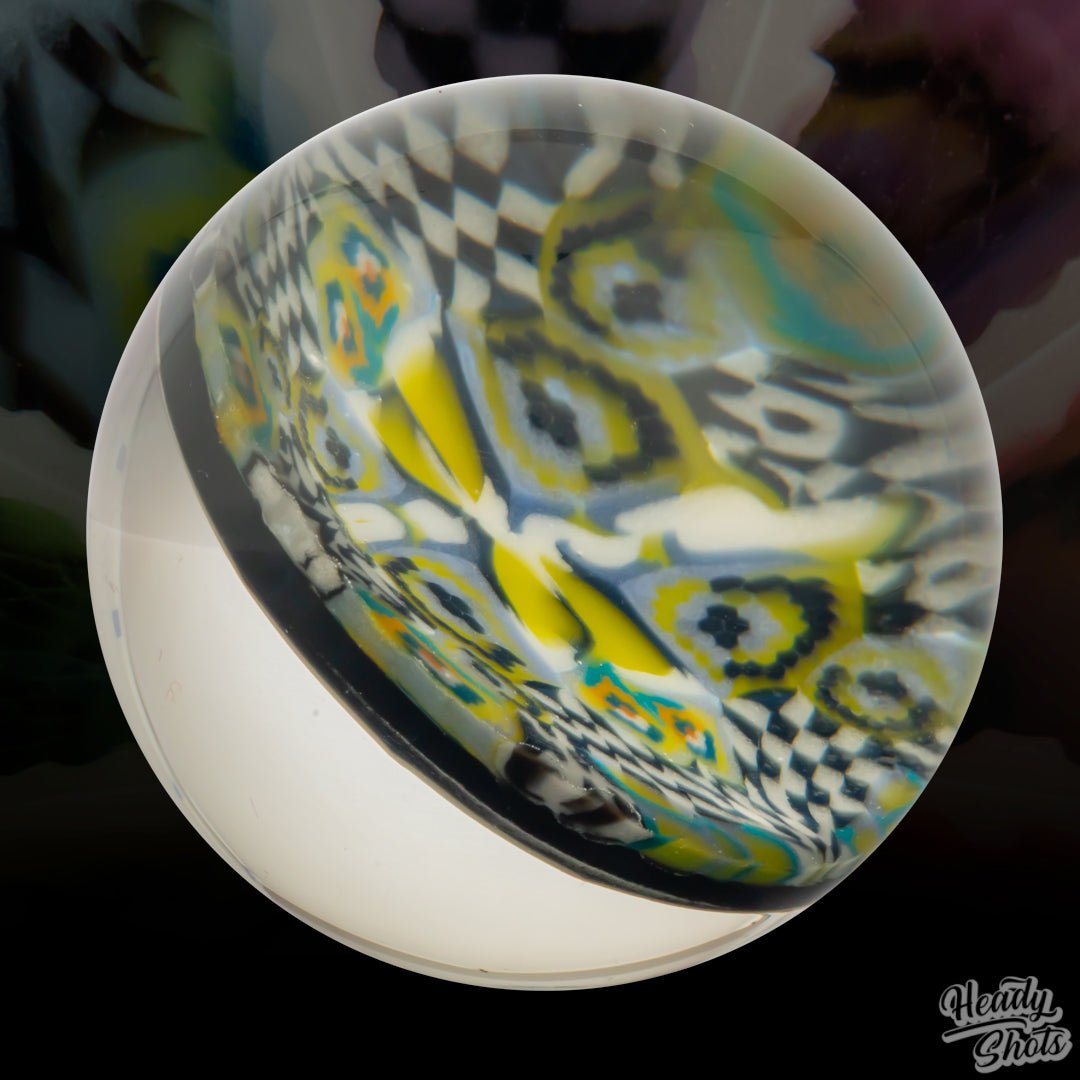 Glass Marble Art Collectible by J Fell x Lyons, a must-have for any serious glass enthusiast.