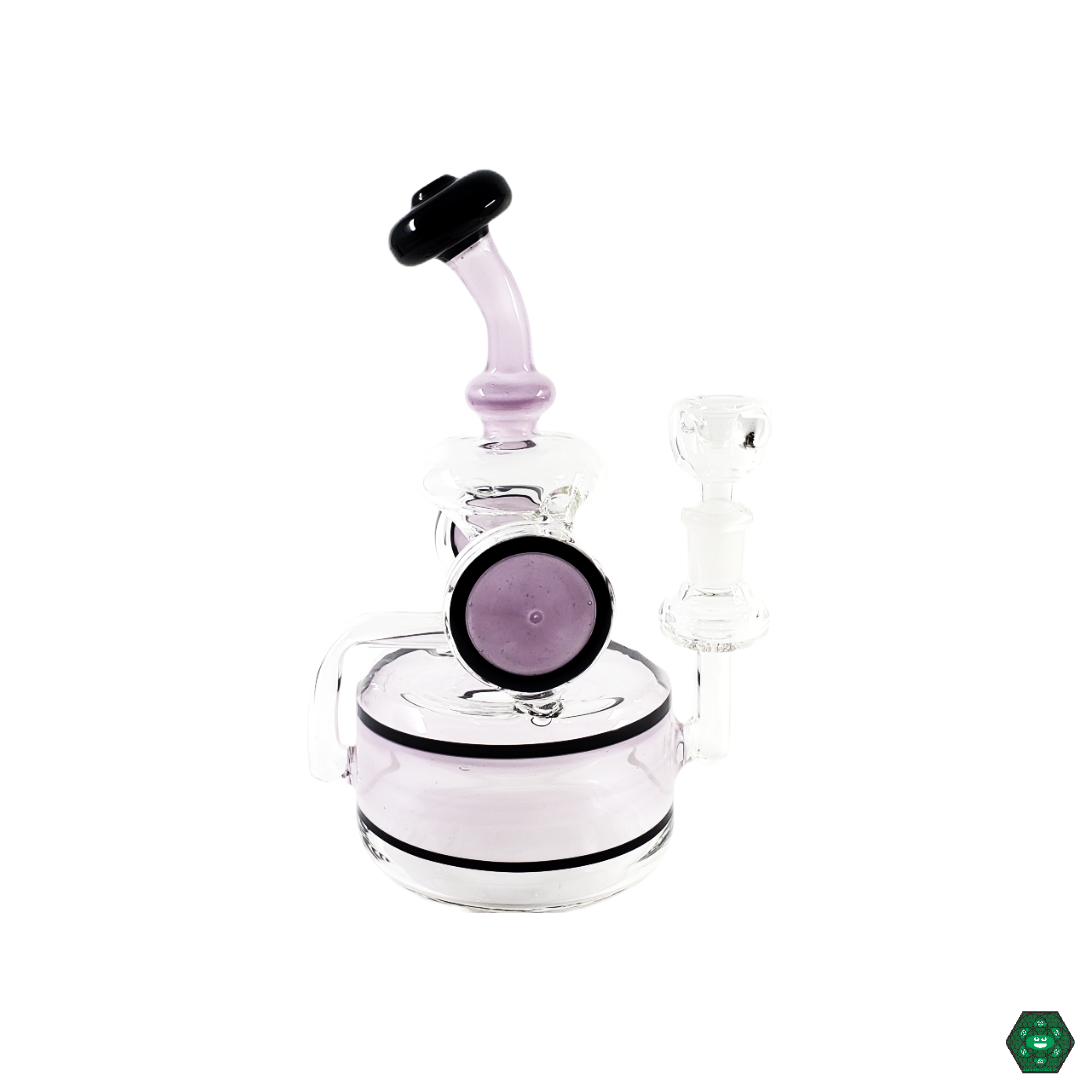  Glass Tribe 9" Disk Recycler in use, showcasing its smooth, powerful hits and high-performance filtration during a dabbing session.