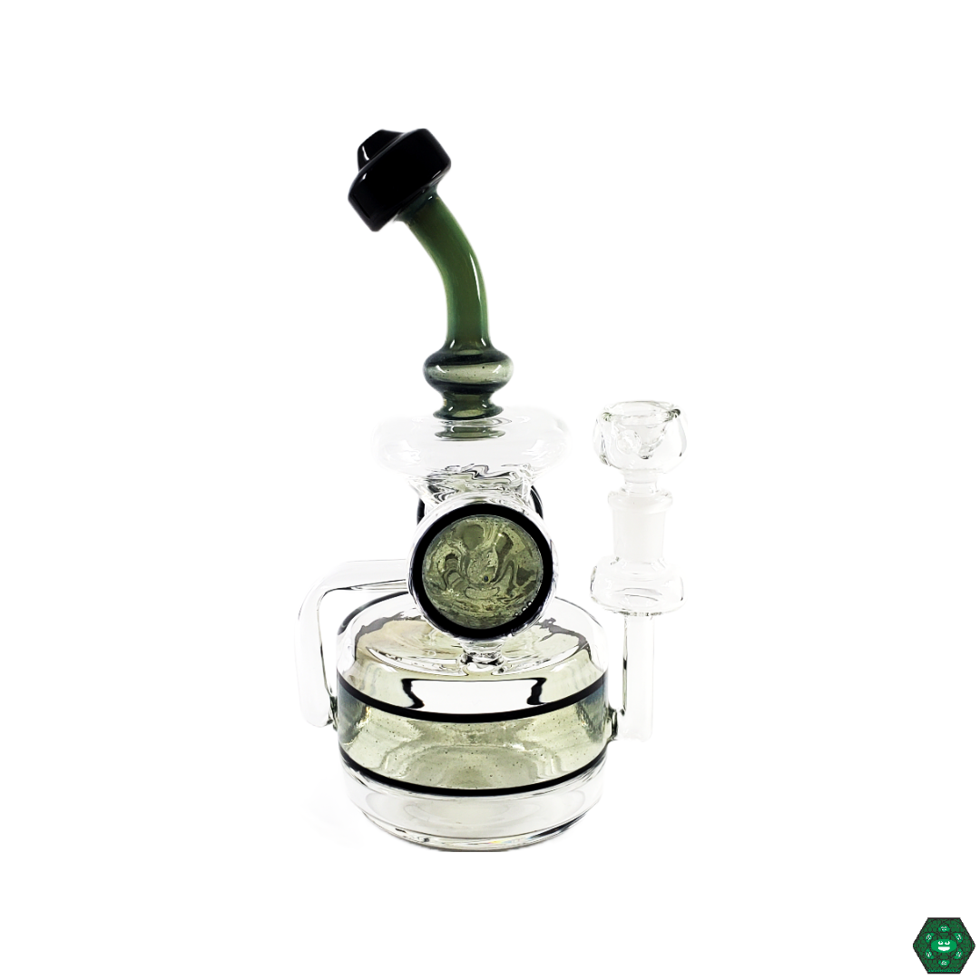  Side view of the Glass Tribe 9" Disk Recycler, highlighting its compact design and high-performance filtration system for an optimized dabbing experience.