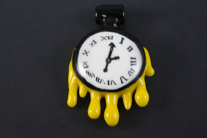  Grimm Clock Pendant, a handcrafted glass jewelry piece featuring intricate details and a unique clock-inspired design.