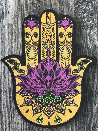  Hamsa Dab Mat: This 10-inch mat from East Coasters features a Hamsa design, offering both artistic appeal and practical protection for your dabbing setup.


