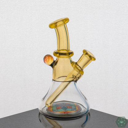 Handcrafted Brian Jacobson Mini Glass Tube with 10mm female joint, featuring a vibrant plasma colorway.