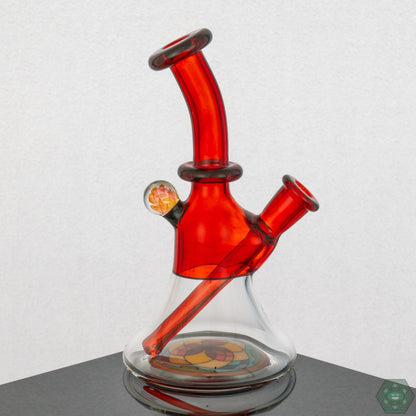 Handcrafted Brian Jacobson Mini Glass Tube, 8 inches tall, featuring a vibrant pomegranate color design.