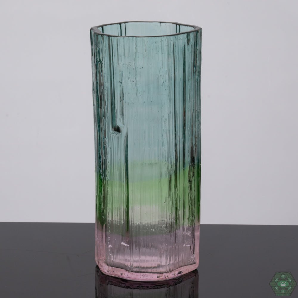 Handcrafted Drinking Glass: Enjoy your beverages in style with this elegantly handcrafted tall glass from Digger Glass, perfect for adding a touch of artistry to any occasion.