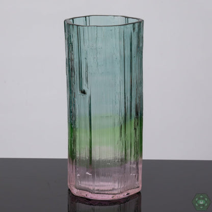 Handcrafted Drinking Glass: Enjoy your beverages in style with this elegantly handcrafted tall glass from Digger Glass, perfect for adding a touch of artistry to any occasion.