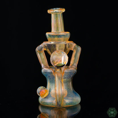 Handcrafted Fumed Glass Rig: The STF Glass Fumed Recycler #4 is a handcrafted piece, showcasing the artistry and skill of the glassblower in a compact and functional design.