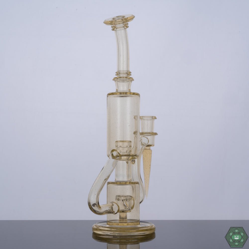 Handcrafted Glass Dab Rig: The Plasma Bubble Dumper by The Glass Carpenter is a meticulously handcrafted piece, showcasing the artistry and skill of the glassblower.


