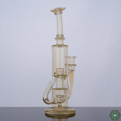Handcrafted Glass Dab Rig: The Plasma Bubble Dumper by The Glass Carpenter is a meticulously handcrafted piece, showcasing the artistry and skill of the glassblower.


