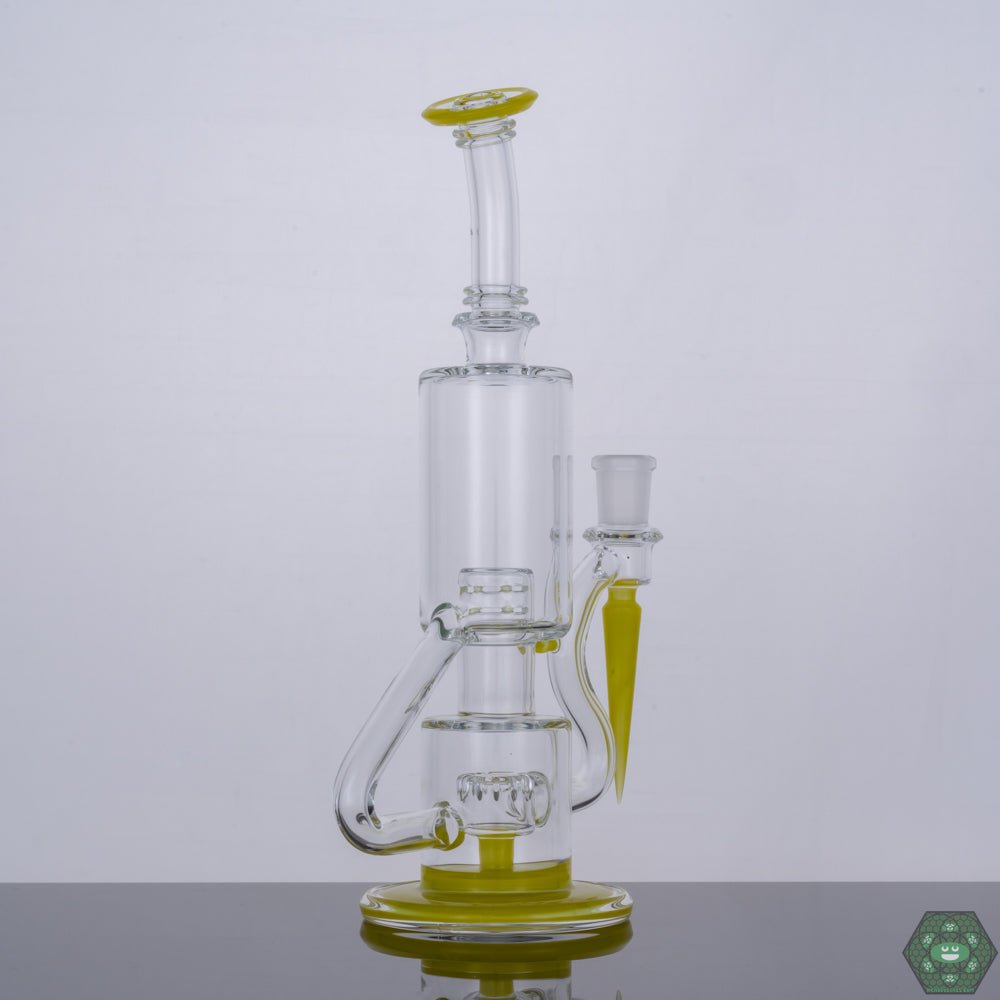Handcrafted Glass Recycler: This Roswell Bubble Dumper is handcrafted by The Glass Carpenter, showcasing their artistry and skill in glassblowing.