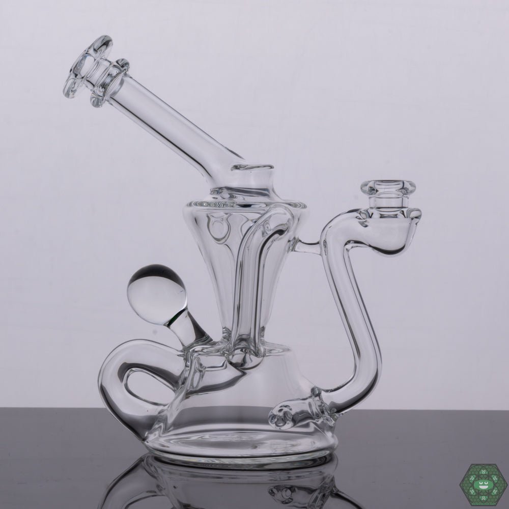 Handcrafted Mini Recycler: The Torch D Boro Clear Mini Klein #1 is a handcrafted glass piece, perfect for collectors who appreciate high-quality craftsmanship.


