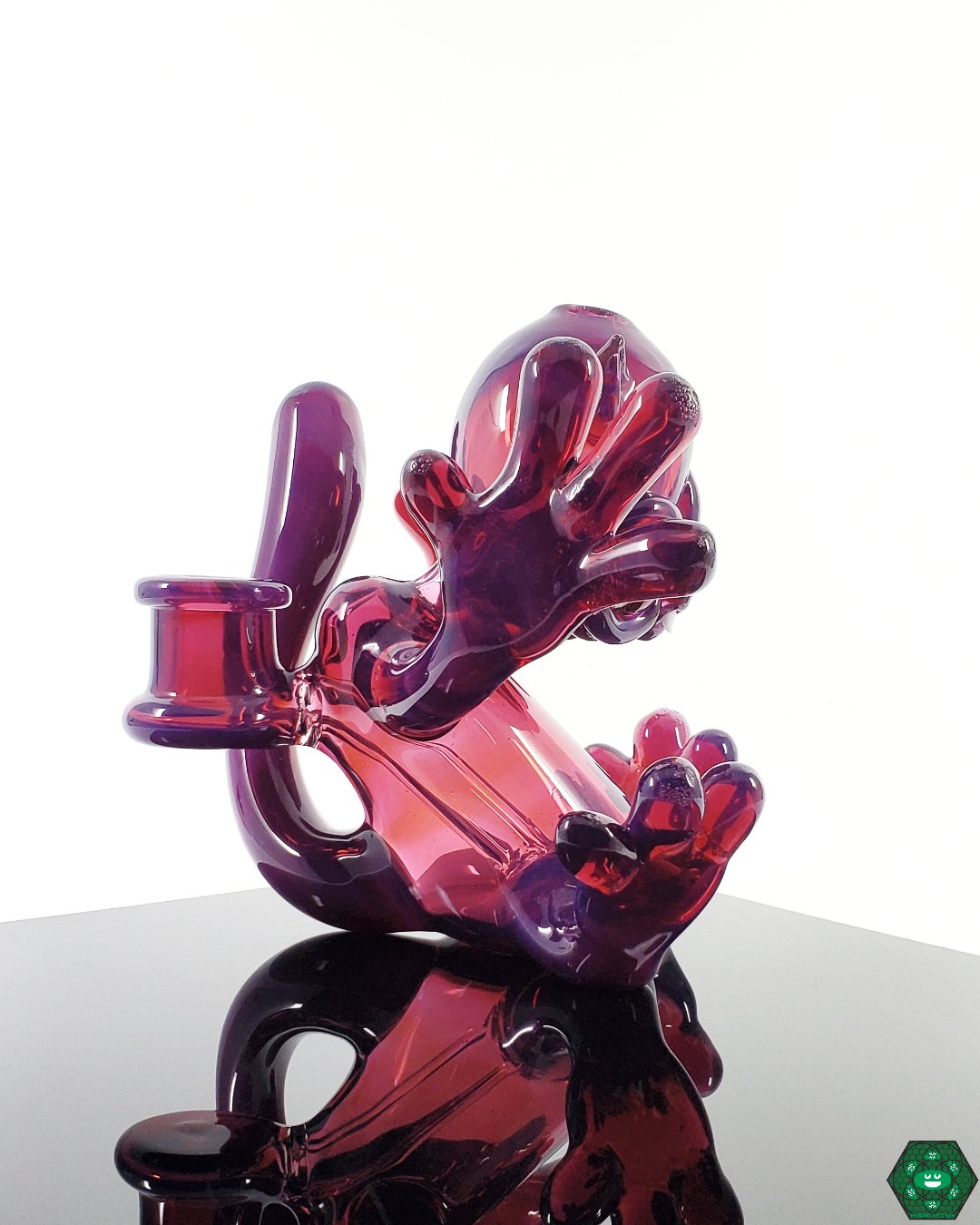 Heady Glass Dab Rig with Art Accents: The Casto Glass Blickey Sitdown, a functional work of art featuring intricate details and vibrant colors.
