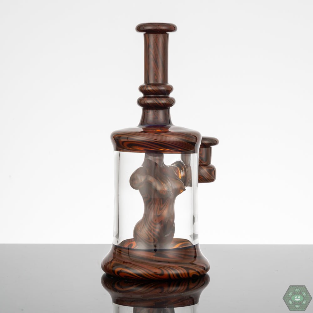  Heady Glass Rig with UV Accents: The Kaleb Folck BBiB #25 features vibrant UV accents, adding a unique and eye-catching dimension to this heady glass piece.


