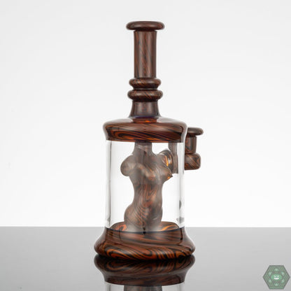  Heady Glass Rig with UV Accents: The Kaleb Folck BBiB #25 features vibrant UV accents, adding a unique and eye-catching dimension to this heady glass piece.


