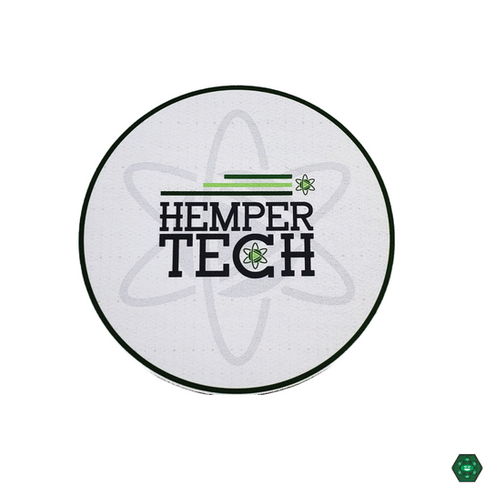 Hemper Tech 8" Glass Pad, a premium heat-resistant mat designed to protect glass rigs, offering stability and style with multiple design options.