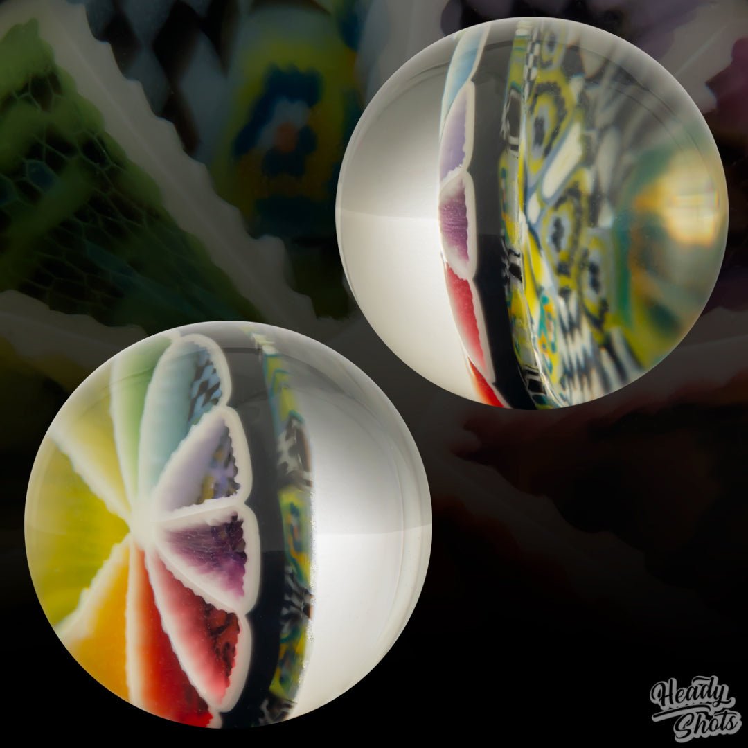 Close-up view of the J Fell x Lyons Marble, highlighting the intricate details and vibrant colors of this glass masterpiece.