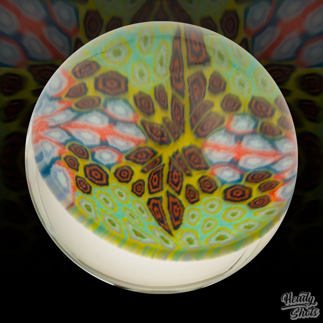J Fell Marble, showcasing vibrant colors and handcrafted from high-quality borosilicate glass.