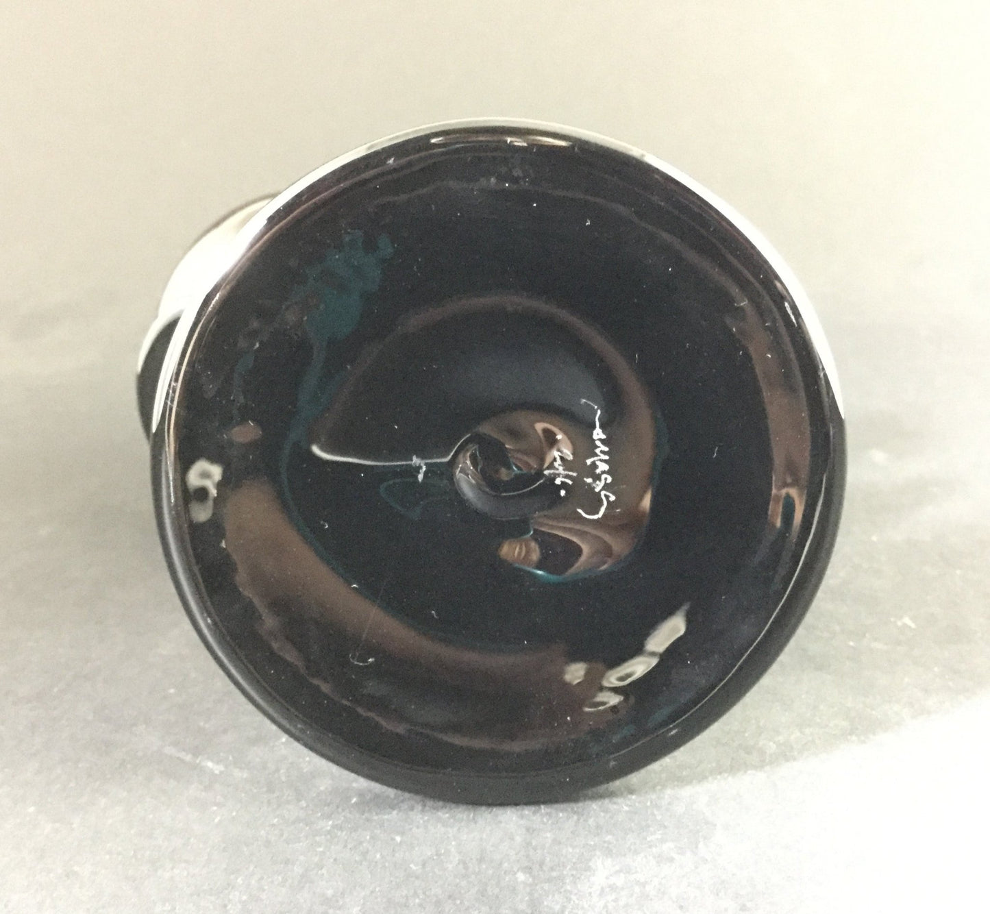 Jmass Errllock, a collectible glass dabber with an artistic and functional design, ideal for concentrate users.