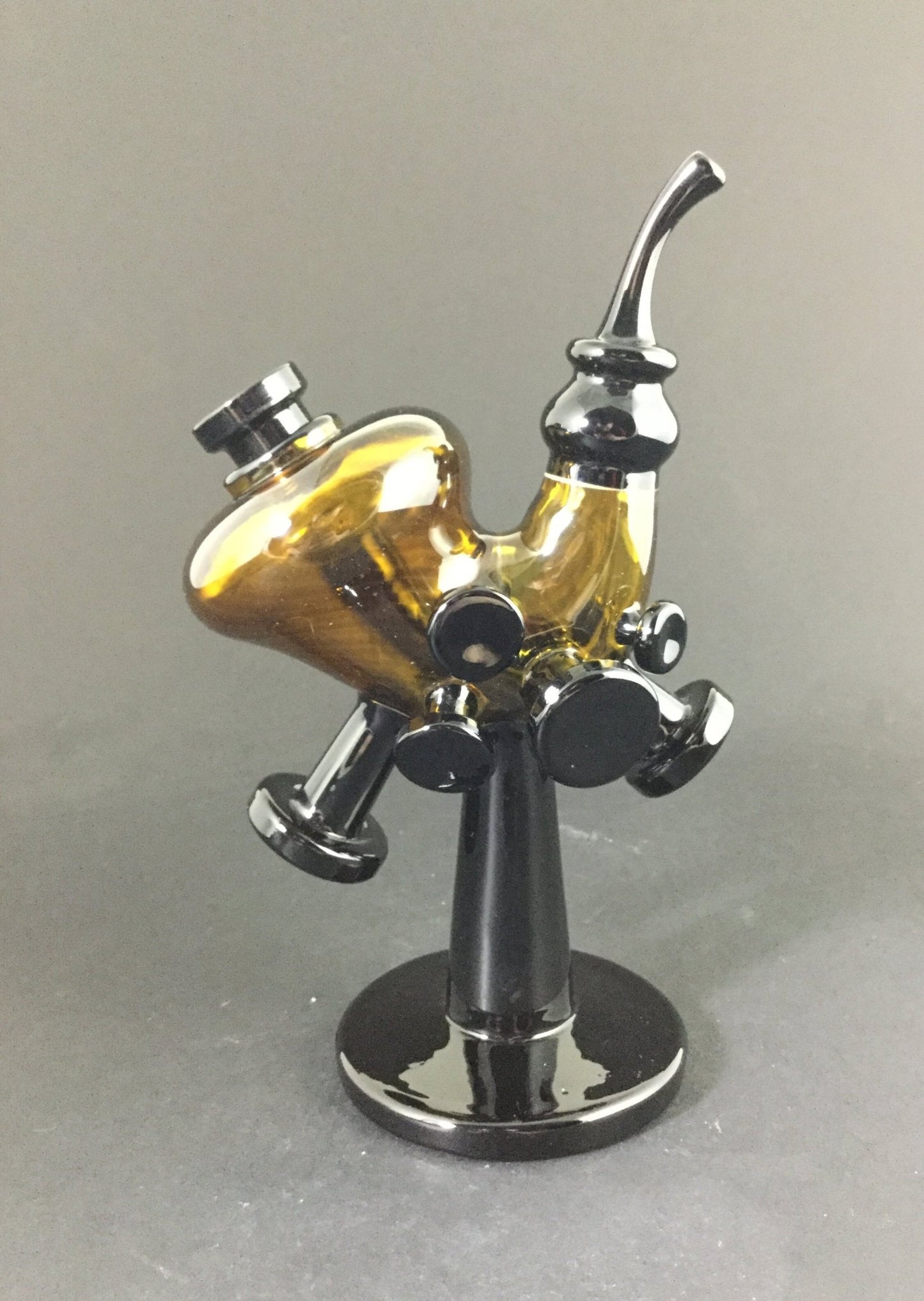 Jmass Errllock, a precision-crafted glass dabber designed for efficient concentrate handling and smooth dabbing sessions.