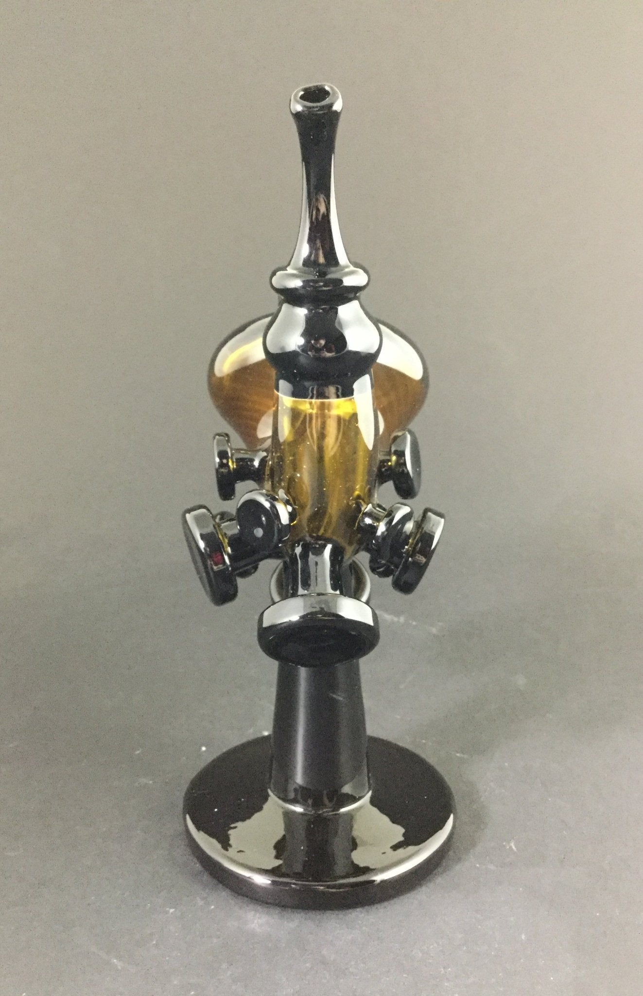 Jmass Errllock, a unique glass dabber featuring an intricate design for enhanced control and precision.