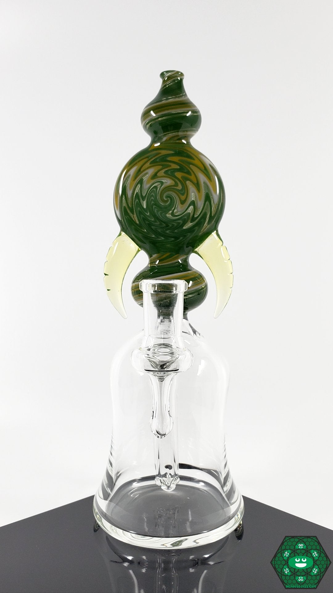 Jon E Walker Mini Tube – 3-hole perc design with Green/Yellow Wig Wag and Illuminati styles for added aesthetic appeal and smooth filtration.