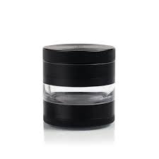 Kannastor 2.5” Jar Body Grinder: Herb grinder with built-in storage jar for convenient grinding and fresh herb storage.


