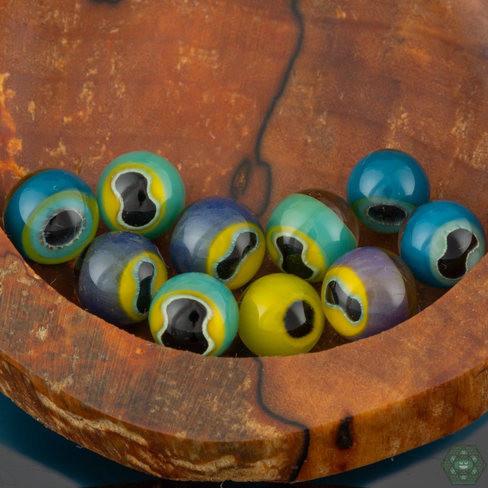 Liz Wright Glass Terp Pearls, artist-made dab pearls handcrafted by Liz Wright, adding both artistry and functionality to your dabbing setup, ideal for heat distribution.