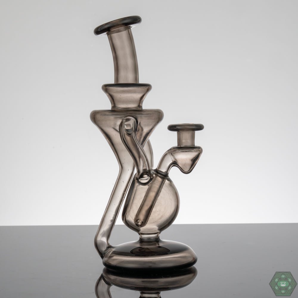  M Henny Smoke Recycler, a 10mm smoke-tinted dab rig with dual uptake and a 2-hole perc for smooth airflow, featuring an elegant design for a refined dabbing experience, suitable for enthusiasts and collectors alike.