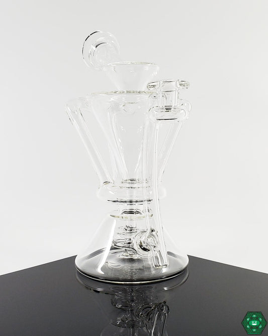  McGrew Glass Clear Internal Recycler #3, an elegant and functional glass recycler offering a seamless blend of style and performance, featuring an intricate internal recycling design for smooth, filtered hits and an elevated experience, a must-have for glassware collectors seeking top-tier quality.


