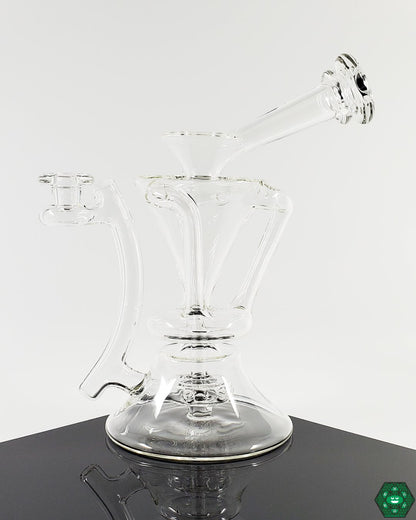  McGrew Glass Clear Internal Recycler #5 Details: Close-up showcasing the clear glass construction and internal recycling system designed for superior filtration and smooth hits.
