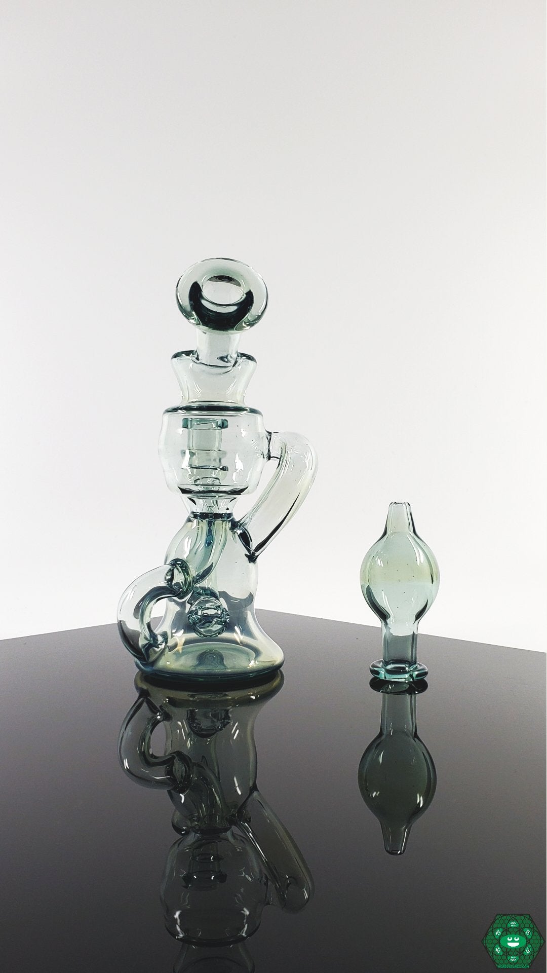 Mini Klein Recycler: The Professor Dank Mini, a portable glass rig perfect for smooth and flavorful dabs on the go.